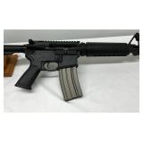 front sight post, flat-top receiver rail for optics, and a detachable 30-round magazine front sight post, flat-top receiver rail for optics, and a detachable 30-round magazine