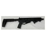 black anodized aluminum receiver with manufacturer markings, railing, an adjustable rear stock black anodized aluminum receiver with manufacturer markings, railing, an adjustable rear stock