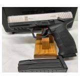textured grips, accessory rail, and a striker-fired action textured grips, accessory rail, and a striker-fired action