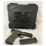 OD green polymer frame with a textured grip, fiber optic sights, and accessory rail