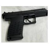 black polymer frame with textured grip panels, slide serrations, and accessory rail