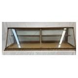 Wood-Framed Glass Display Case with Slant Front, 27in by 72in