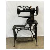 Singer Treadle Sewing Machine with Cast Iron Base, 27in by 24in