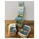 Vintage Travel Maps Including ‘Tourgide’, Shell, and State Maps in Wire Display Rack