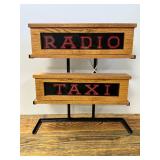 Illuminated ‘Radio Taxi’ Display Sign, 24 x 25 Inches