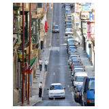 Please Park on one side of the street