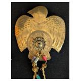 Pair of Native American Metal Brooches