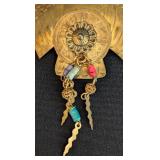 Pair of Native American Metal Brooches