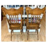 Pair of Carved Oak Griffin Armchairs with Detailed Crest Backs