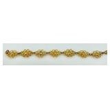 Collection of Gold-Tone Necklaces and Rhinestone Bracelet
