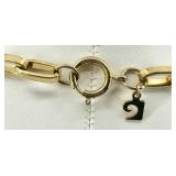 Collection of Gold-Tone Necklaces and Rhinestone Bracelet