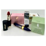 Collection of Luxury Makeup Including Lipsticks, Mascara, and Clinique Moisture Surge