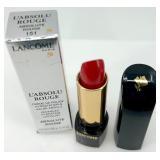 Collection of Luxury Makeup Including Lipsticks, Mascara, and Clinique Moisture Surge