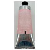 Collection of Luxury Makeup Including Lipsticks, Mascara, and Clinique Moisture Surge