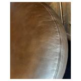 Marge Carson Round Leather Ottoman with Decorative Wood Base