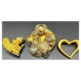 Collection of 10 Vintage Costume Brooches and Pins with Floral, Figural, and Gemstone Designs