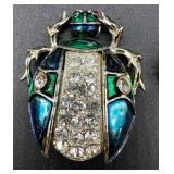 Collection of 10 Vintage Costume Brooches and Pins with Floral, Figural, and Gemstone Designs
