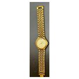 Bulova Quartz Gold-Tone Wristwatch with Day-Date Display