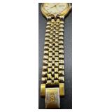 Bulova Quartz Gold-Tone Wristwatch with Day-Date Display