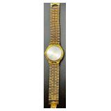Bulova Quartz Gold-Tone Wristwatch with Day-Date Display