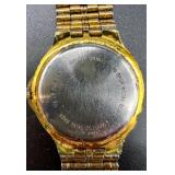 Bulova Quartz Gold-Tone Wristwatch with Day-Date Display