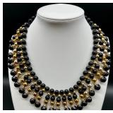 Vintage Jewelry Set - Black and Gold Bead Necklace, Monet Gold-Tone Bracelet, and Rhinestone Clip Earrings