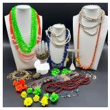 Collection of Colorful Vintage Beaded Necklaces with Matching Earrings and Floral Clip-Ons