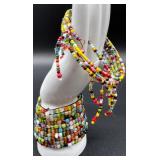 Collection of Colorful Vintage Beaded Necklaces with Matching Earrings and Floral Clip-Ons