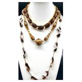 Vintage Monet and Trifari Gold-tone Costume Jewelry Collection with Necklaces, Bracelets, and Earrings