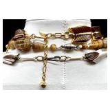 Vintage Monet and Trifari Gold-tone Costume Jewelry Collection with Necklaces, Bracelets, and Earrings