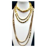 Vintage Monet and Trifari Gold-tone Costume Jewelry Collection with Necklaces, Bracelets, and Earrings