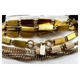 Vintage Monet and Trifari Gold-tone Costume Jewelry Collection with Necklaces, Bracelets, and Earrings