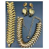 Vintage Monet and Trifari Gold-tone Costume Jewelry Collection with Necklaces, Bracelets, and Earrings