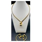 Vintage Monet and Trifari Gold-tone Costume Jewelry Collection with Necklaces, Bracelets, and Earrings