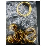 Vintage Monet and Trifari Gold-tone Costume Jewelry Collection with Necklaces, Bracelets, and Earrings