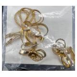 Vintage Monet and Trifari Gold-tone Costume Jewelry Collection with Necklaces, Bracelets, and Earrings