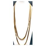 Vintage Monet and Trifari Gold-tone Costume Jewelry Collection with Necklaces, Bracelets, and Earrings