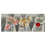 Collection of 7 Costume Jewelry Rings with Pink and Clear Stones
