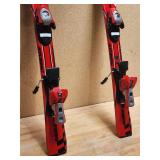Pair of Youth Atomic Racing Down Hill Ski