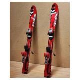 Pair of Youth Atomic Racing Down Hill Ski