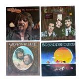 LR - Collection of 8 Vinyl Record Albums Including Waylon Jennings, Crowded House, Robert Hunter and More