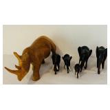 K - African Carved Wood Rhino and Set of 4 Elephant Figurines