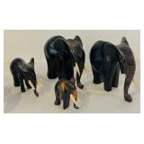 K - African Carved Wood Rhino and Set of 4 Elephant Figurines