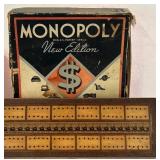 K - Vintage Game and Book Collection Including Monopoly, Cribbage Board, Compass, and Poor Richard