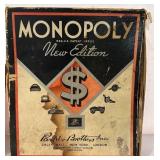 K - Vintage Game and Book Collection Including Monopoly, Cribbage Board, Compass, and Poor Richard