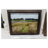 Lot of Framed Art Pieces a landscape photograph of a field with a river, a framed image of an old brick doorway overgrown with plants, a playful illustration featuring teddy bears and animals, and a b