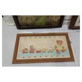 Lot of Framed Art Pieces a landscape photograph of a field with a river, a framed image of an old brick doorway overgrown with plants, a playful illustration featuring teddy bears and animals, and a b