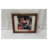 Framed Art and Photographs The largest piece depicts a young girl leading geese, a religious scene, cityscapes and a Coca-Cola themed print