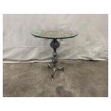 Glass Top Accent Table with Ornate Brass Medallion and Metal Base