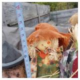 Decorative Fall and Christmas Figures including Scarecrow, Witch, and Santa